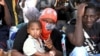      لیبیا   کی سرحد پر پھنسے سینکڑوں تارکین وطن  کی تیونس واپسی  