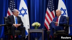 صدر بائیڈن اسرائیلی وزیر اعظم کے ساتھ۔فائل فوٹو
