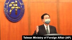 تائیوان کے وزیر خارجہ جوزف ووتائپے میں ایک نیوز کانفرنس کے دوران : فوٹو اےپی