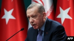 Tổng thống Thổ Nhĩ Kỳ Recep Tayyip Erdogan. Ông Erdogan đã phải đối mặt với những chỉ trích ngày càng tăng về việc chính phủ của ông tiếp tục duy trì mối quan hệ thương mại với Israel.