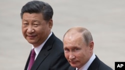 Chủ tịch Trung Quốc Tập Cận Bình và Tổng thống Nga Vladimir Putin.