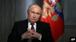 Tổng thống Nga Vladimir Putin phát biểu trước ống kính ở Moscow, Nga, vào ngày 12/3/2024.