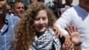 Thiếu niên Palestine tát lính Israel thề tiếp tục tranh đấu