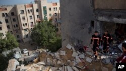 ۔۔اسرائیل فلسظین تنازعہ۔شمالی غزہ میں اسرائیلی میزائل حملے کا نشانہ مسمار شدہ عمارت