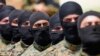 لبنانی عسکریت پسند گروپ حزب اللہ کے جنگجوؤں نے اتوار 21 مئی 2023 کو جنوبی لبنان کی جیزین ڈسٹرکٹ کے ارمتا گاؤں میں ایک تربیتی مشق کی۔ اے پی فوٹو
