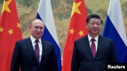 Tổng thống Nga Vladimir Putin gặp Chủ tịch Trung Quốc Tập Cận Bình tại Bắc Kinh ngày 4/2/2022.