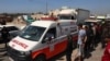  اسرائیلی حملے میں ہلاک ہونے والے ورلڈ سینٹرل کچن کے غیر ملکی امدادی کارکنوں کی لاشیں رفح کراسنگ کے راستے مصر لے جاتے ہوئے، فوٹو اے ایف پی ، 3 اپریل 2024